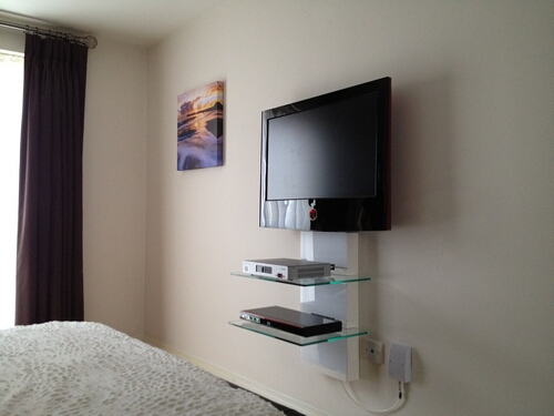 Standard TV Wall Installation with Floating Shelves