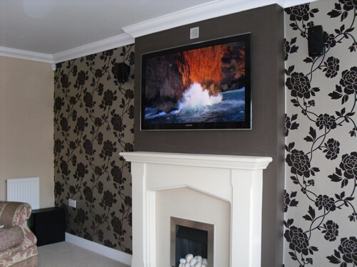 TV Mounted above Fireplace Hidden Cabling