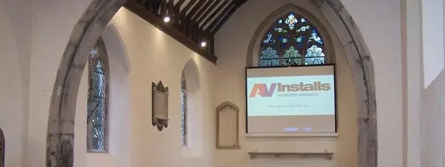 church audio visual projector installation with a big screen