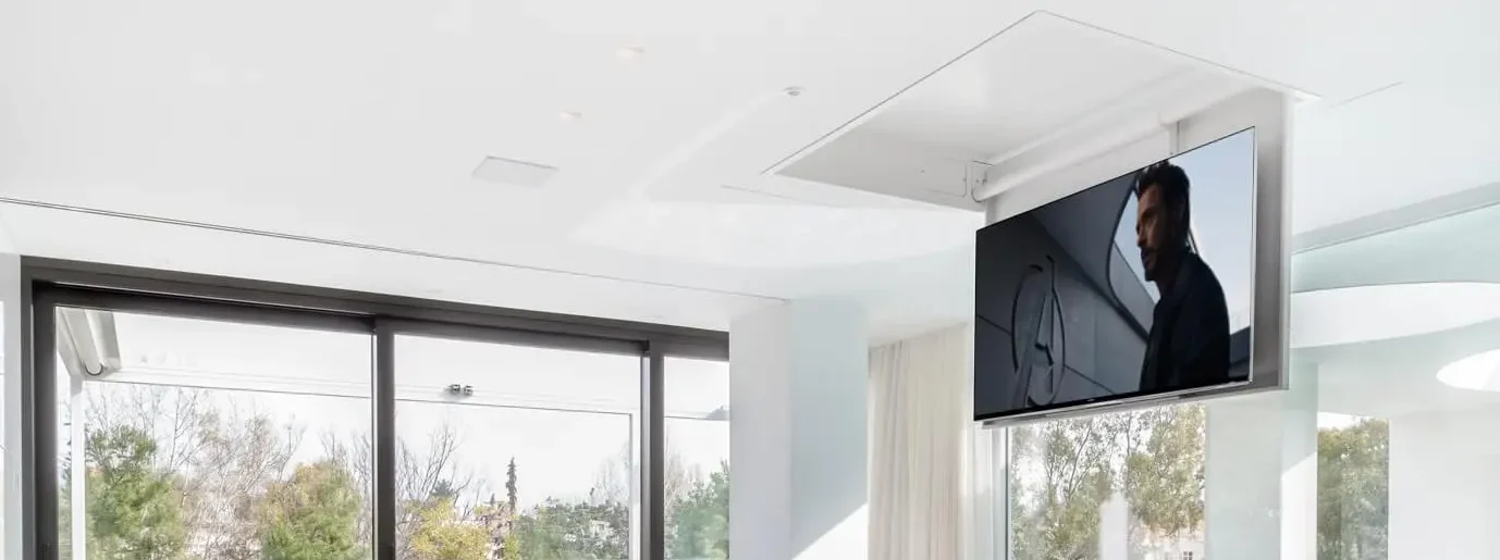 fold down tv lift mechanism in a open plan apartment
