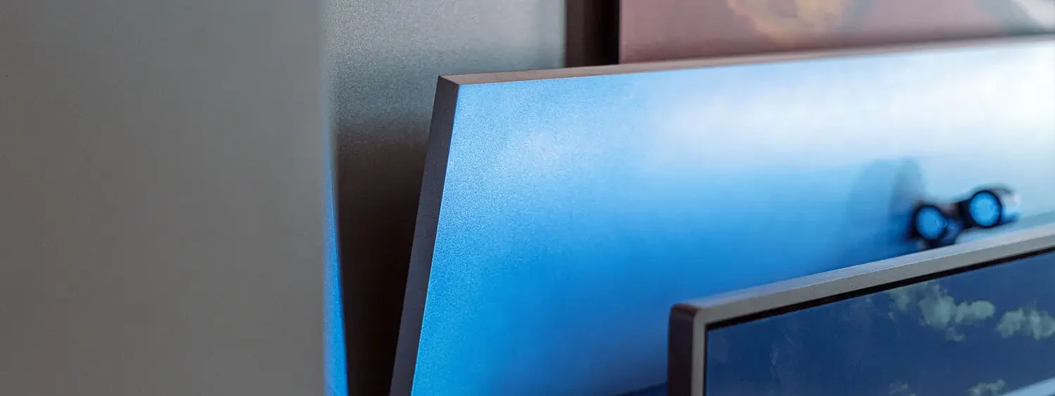 tv popping up out of a cabinet with a hinged lid