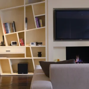 tv wall mounted in a bookcase using a future automation fb48 flat tv mount