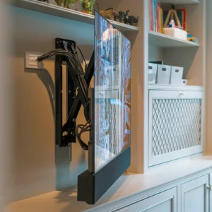 tv mounted in media wall using a future automation ps65 tv bracket