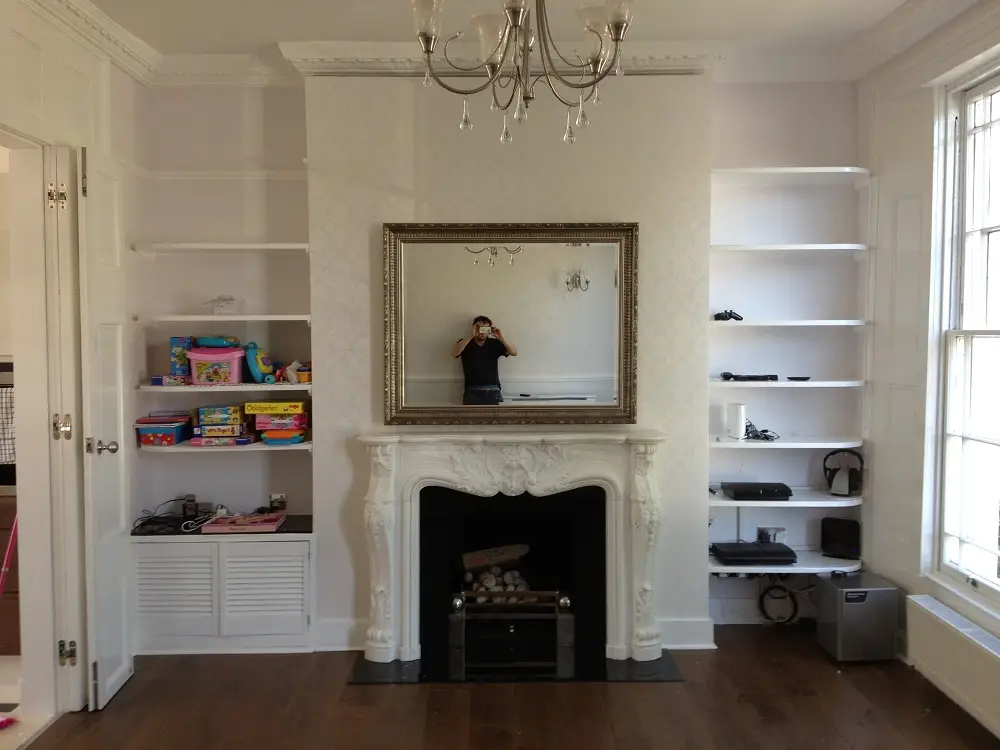 motorised moving artwork lift with hidden tv behind