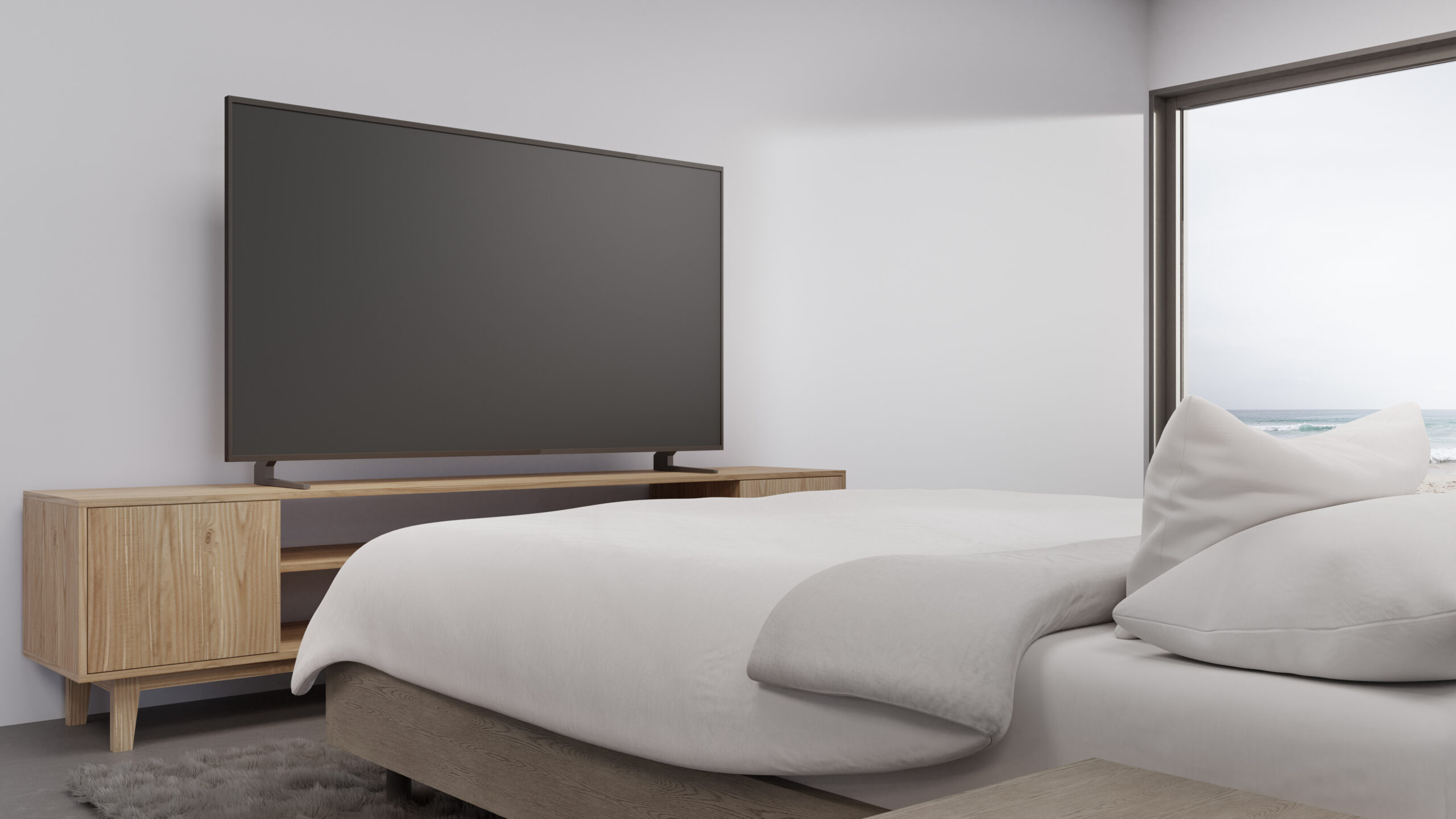 large TV on a cabinet in a bedroom